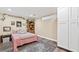 Bedroom featuring hardwood floors, area rug, and built in cabinets at 3420 Aviary Ln, Acworth, GA 30101