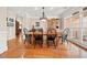 Charming dining room with hardwood floors and large windows offering abundant natural light at 3420 Aviary Ln, Acworth, GA 30101