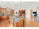 Open kitchen with granite counters, stainless appliances and island at 3420 Aviary Ln, Acworth, GA 30101
