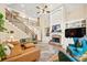 Spacious living room with a fireplace, high ceilings, built-in shelving, and hardwood floors at 3420 Aviary Ln, Acworth, GA 30101