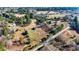 Expansive property with a mix of homes, barns, and outbuildings, surrounded by forests and open land at 3625 Pointer Rd, Loganville, GA 30052