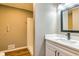 This is a bathroom vanity with modern finishes and a shower at 3625 Pointer Rd, Loganville, GA 30052