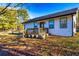 Quaint home featuring a lovely front porch, well-manicured lawn, and charming architectural details at 3625 Pointer Rd, Loganville, GA 30052