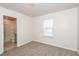 Cozy bedroom with private bath and carpet flooring at 1347 Sunny Lake Dr, Lawrenceville, GA 30043