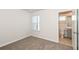 Bright bedroom with private bathroom and carpet flooring at 1347 Sunny Lake Dr, Lawrenceville, GA 30043