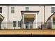 Townhouse exterior with private fenced-in patio at 1347 Sunny Lake Dr, Lawrenceville, GA 30043