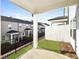 Private patio with grassy yard and townhome views at 1347 Sunny Lake Dr, Lawrenceville, GA 30043