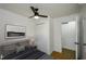 This bedroom has a ceiling fan and a closet at 474 Fairlock Nw Ln, Atlanta, GA 30331