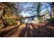 View of the back of the house in wooded backyard at 474 Fairlock Nw Ln, Atlanta, GA 30331