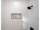 Clean, modern shower with vertical tile and a niche at 474 Fairlock Nw Ln, Atlanta, GA 30331