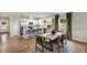 Spacious kitchen with a center island, stainless steel appliances, and adjacent dining area at 443 Village Ln, Fairburn, GA 30213