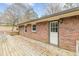 View of the back deck with a door leading inside the home, great for outdoor enjoyment at 4485 Canary Ct, Lithia Springs, GA 30122