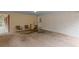 Covered carport featuring 2 chairs, a back door, and good lighting at 4485 Canary Ct, Lithia Springs, GA 30122