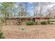 Charming one-story brick home with a manicured lawn and mature trees, offering great curb appeal at 4485 Canary Ct, Lithia Springs, GA 30122