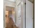 Hallway showing the dining room on the left, and a bedroom and bathroom on the right at 4485 Canary Ct, Lithia Springs, GA 30122