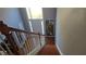 View of staircase leading to the upper level at 725 Cricket Hill Trl, Lawrenceville, GA 30044