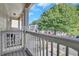 Scenic balcony view of manicured lawns and beautiful townhomes in neighborhood at 1081 Liberty Pkwy, Atlanta, GA 30318