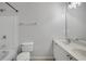 Bright bathroom featuring a shower-tub combo and double vanity at 1081 Liberty Pkwy, Atlanta, GA 30318