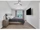 Neutral bedroom featuring a ceiling fan and mounted TV at 1081 Liberty Pkwy, Atlanta, GA 30318