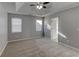 Spacious bedroom with carpet, ceiling fan, and neutral walls at 1624 Graystone Dr, Hampton, GA 30228