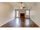 Spacious living room with hardwood floors, fireplace, and vaulted ceiling at 1624 Graystone Dr, Hampton, GA 30228