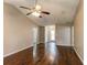Living room with hardwood floors and access to entryway at 1624 Graystone Dr, Hampton, GA 30228