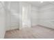 Spacious walk-in closet with ample shelving and hanging space at 615 Grassmeade Ln, Woodstock, GA 30188