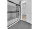 Modern bathroom with a frameless glass shower and gray tile at 3290 Ethan Dr, Marietta, GA 30062