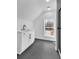 Contemporary bathroom with white vanity and gray tile floors at 3290 Ethan Dr, Marietta, GA 30062
