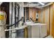 Unfinished basement with washer, dryer, hot water heater, and lots of utilities at 336 Adelene Way, Dallas, GA 30157