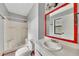 Functional bathroom featuring a tub and shower combo with vanity and a window providing natural light at 336 Adelene Way, Dallas, GA 30157