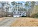 Split level home with a 2-car garage and a long driveway at 336 Adelene Way, Dallas, GA 30157