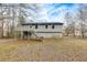 Back exterior view of house featuring a deck and staircase to yard at 336 Adelene Way, Dallas, GA 30157