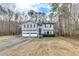 Charming front exterior with well-manicured lawn and attached two car garage at 336 Adelene Way, Dallas, GA 30157
