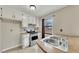 Kitchen featuring stainless steel range, white cabinets, and laminate countertops at 336 Adelene Way, Dallas, GA 30157