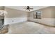Empty living room featuring a fireplace with stone accents and a large window at 336 Adelene Way, Dallas, GA 30157
