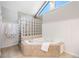 Bright bathroom features a soaking tub with glass block and neutral tile flooring at 1506 Brookridge Dr, Woodstock, GA 30189