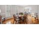 Formal dining room with hardwood floors, traditional decor, and ample seating at 1506 Brookridge Dr, Woodstock, GA 30189