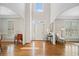 Bright foyer with soaring ceilings, hardwood floors, and elegant architectural details at 1506 Brookridge Dr, Woodstock, GA 30189