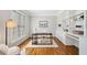 Well-lit home office with built-in shelving and a dedicated workspace at 1506 Brookridge Dr, Woodstock, GA 30189