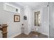 Bright foyer featuring hardwood floors, stylish decor, and a welcoming atmosphere at 646 Brashy St, Woodstock, GA 30188