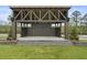 Modern outdoor pavilion with a stage and grassy area at 646 Brashy St, Woodstock, GA 30188