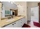 Well-appointed bathroom featuring double sinks and granite countertops at 2007 Woodside Park Dr, Woodstock, GA 30188