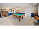 Game room featuring a pool table, half wall, and a bright overhead light at 2007 Woodside Park Dr, Woodstock, GA 30188