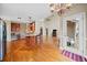 Open concept kitchen flowing into the living area, featuring hardwood floors at 2007 Woodside Park Dr, Woodstock, GA 30188