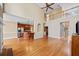 Open-concept living space showcases hardwood floors, a fireplace, and seamless flow to the kitchen at 2007 Woodside Park Dr, Woodstock, GA 30188