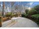 Secluded patio area, perfect for relaxation and outdoor enjoyment in a serene wooded setting at 2007 Woodside Park Dr, Woodstock, GA 30188