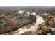 Aerial view showcasing homes and riverfront community at 4458 Paces Battle Nw, Atlanta, GA 30327