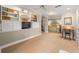 Open-concept bedroom with a cozy sitting area, built-in bookshelves, and neutral decor, creating a comfortable retreat at 4458 Paces Battle Nw, Atlanta, GA 30327