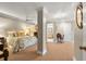 Comfortable bedroom with a decorative metal bed frame, neutral walls, and a glimpse into an en-suite bathroom at 4458 Paces Battle Nw, Atlanta, GA 30327